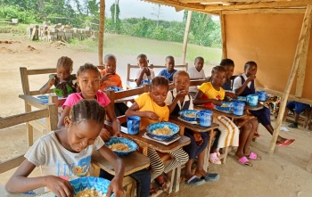 Children eating Mary's Meals in Liberia