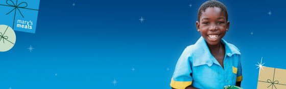 Decorative Christmas background with a smiling child imposed over the top. 