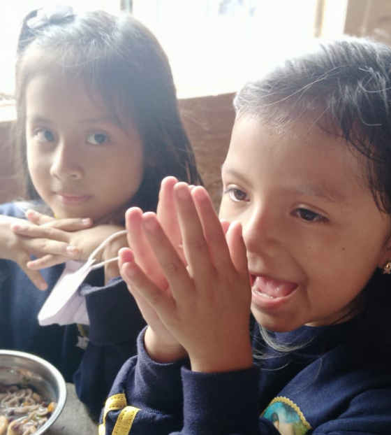 Children eating Mary's Meals in Ecuador