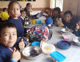 Children eating Mary's Meals in Ecuador